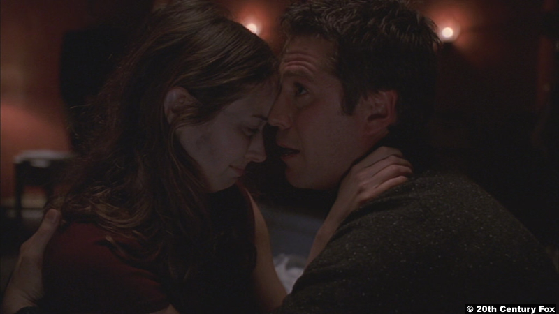 Angel S05e15: Amy Acker and Alexis Denisof as Fred and Wesley